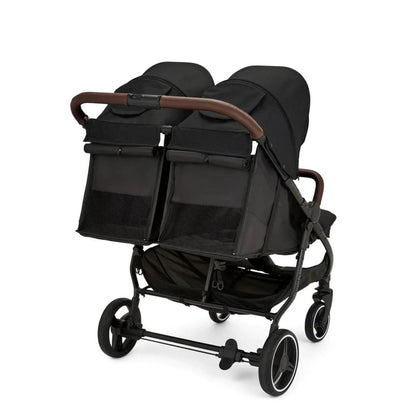 Black double stroller with wooden handles on a white background